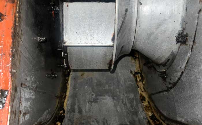 Professionally cleaned rooftop exhaust fan blades free of grease to ensure optimal ventilation performance.